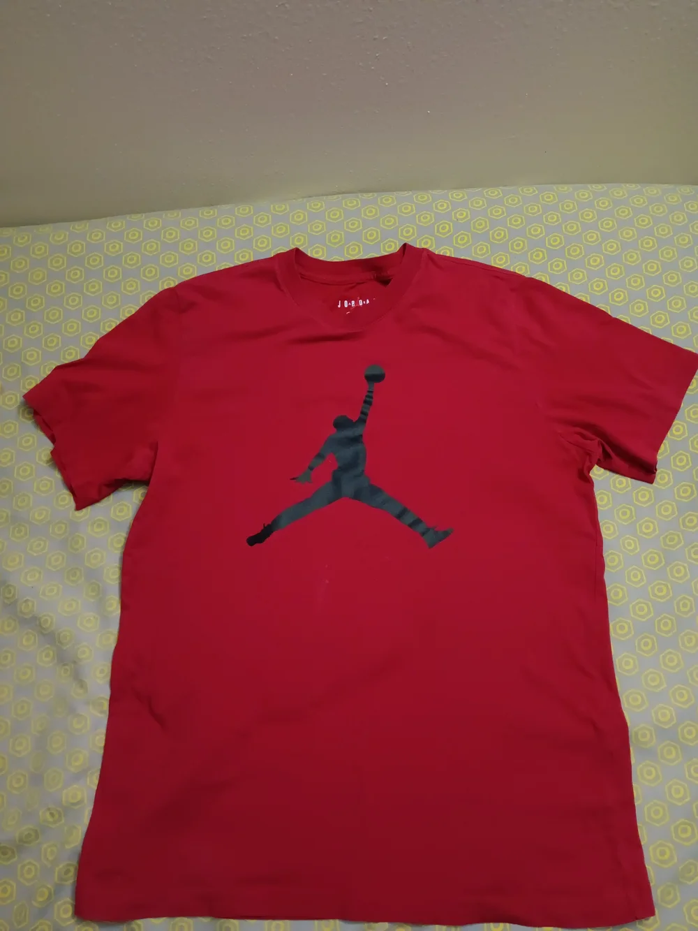 Jordan Red Short Sleeve Tee with Black Jumpman Graphic